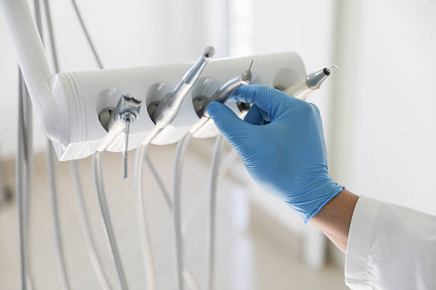 Professional Tooth Extraction technician working in South Brooksville, FL